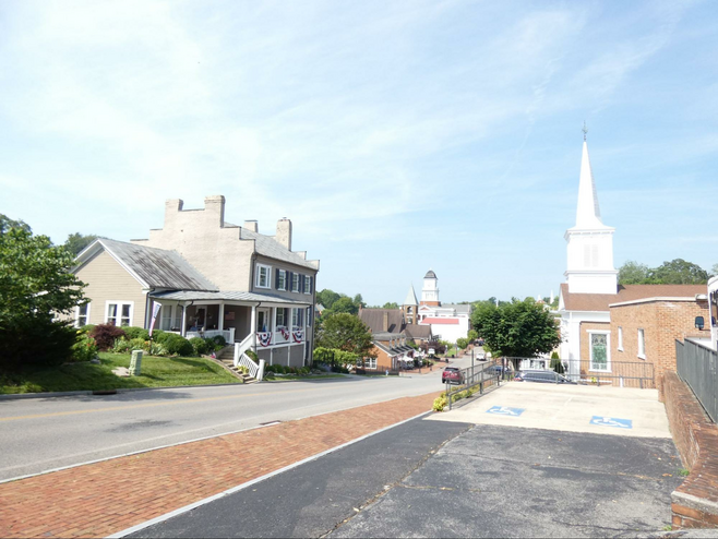 Downtown Jonesborough historic buildings with church steeple in foreground 